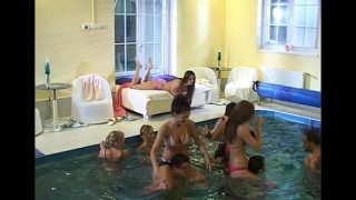 Cute gals get pounded hard in a group fuck by the pool